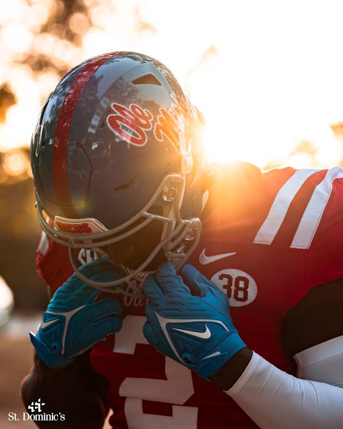 Ole Miss defensive end Cedric Johnson models the Rebels' uniform combination for Saturday's game against Vanderbilt.